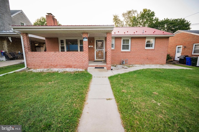 view of front of home with a front yard