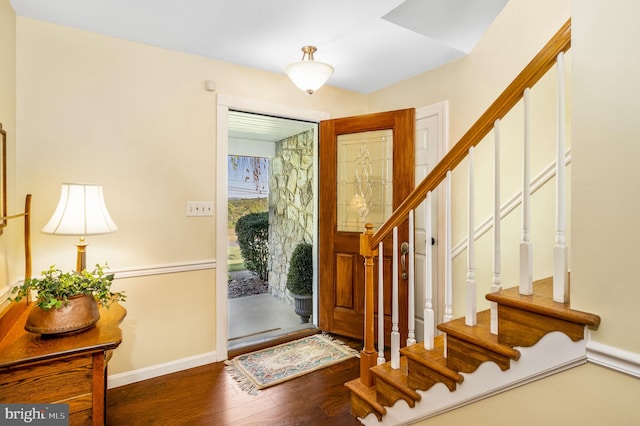 foyer with dark wood-type flooring