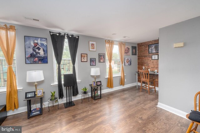 living area with wood-type flooring