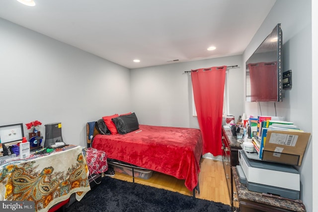 bedroom featuring hardwood / wood-style flooring