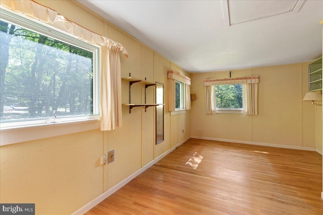 spare room with light wood-type flooring