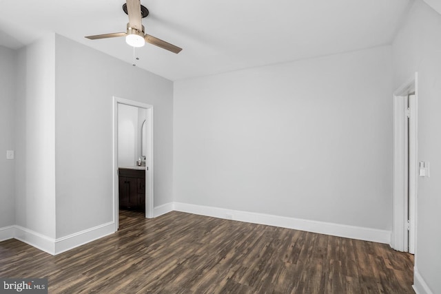 interior space with ceiling fan and dark hardwood / wood-style flooring