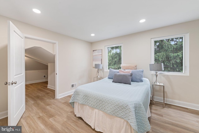 bedroom with light hardwood / wood-style flooring