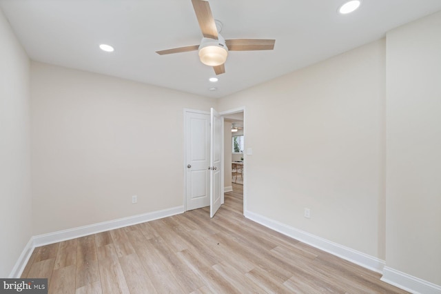 unfurnished bedroom featuring light hardwood / wood-style floors and ceiling fan