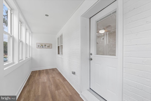 unfurnished sunroom with a wealth of natural light