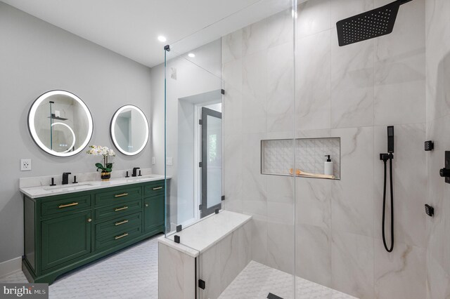 bathroom featuring vanity and a tile shower