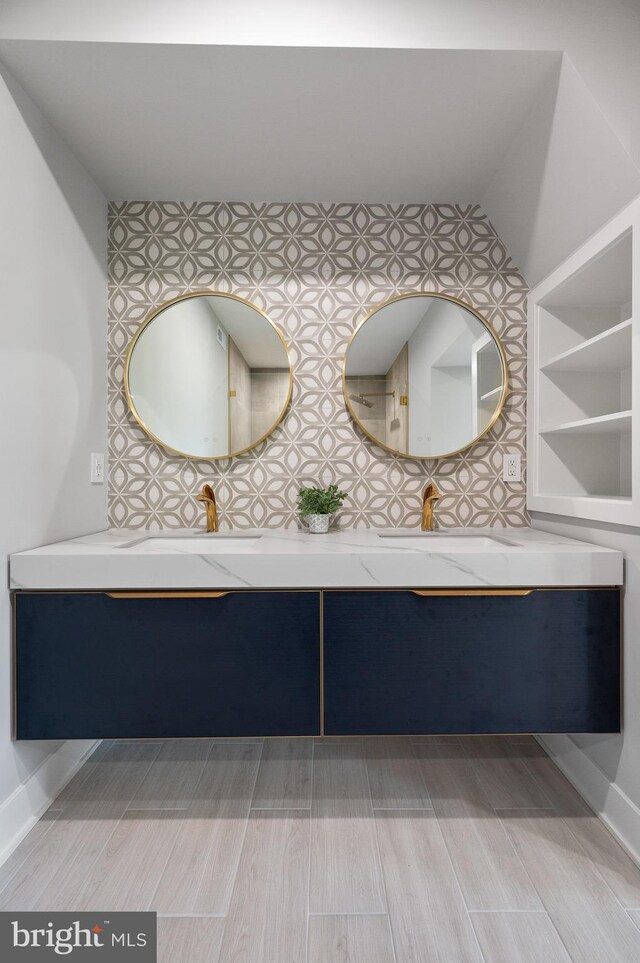 bathroom featuring vanity and hardwood / wood-style floors