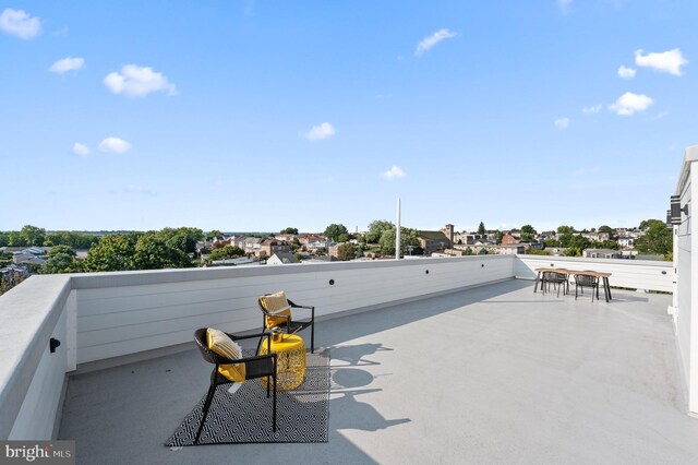 view of patio with a balcony