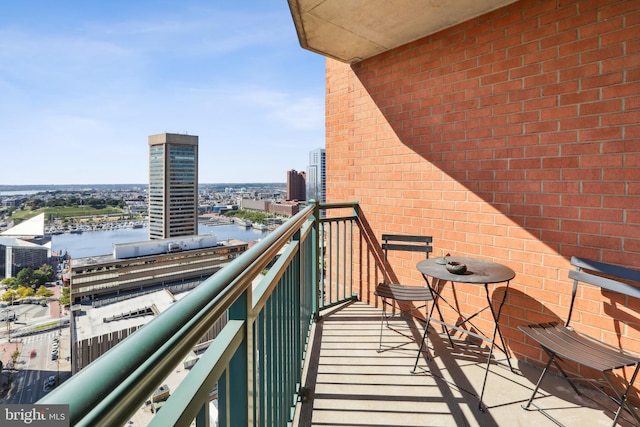 balcony featuring a water view