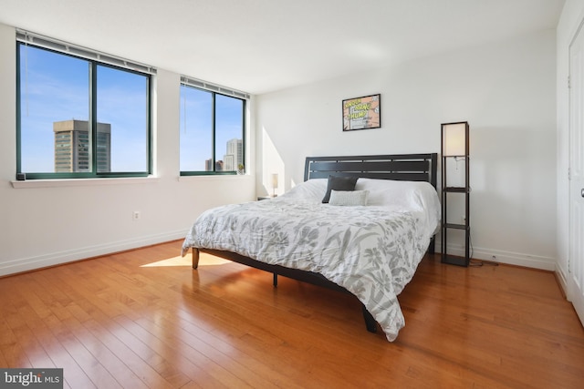 bedroom featuring hardwood / wood-style floors