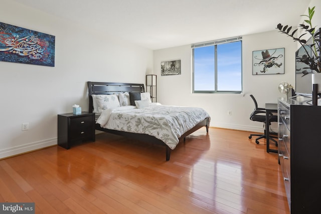 bedroom featuring hardwood / wood-style flooring