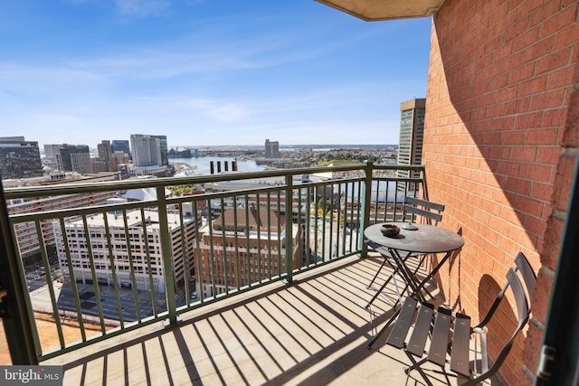 balcony featuring a water view