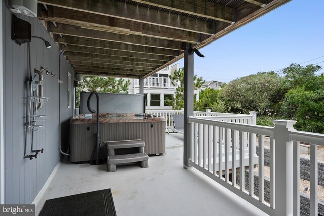 balcony with a hot tub