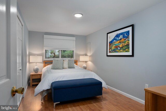 bedroom featuring hardwood / wood-style floors