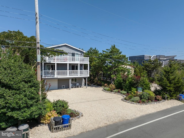 rear view of house featuring a balcony