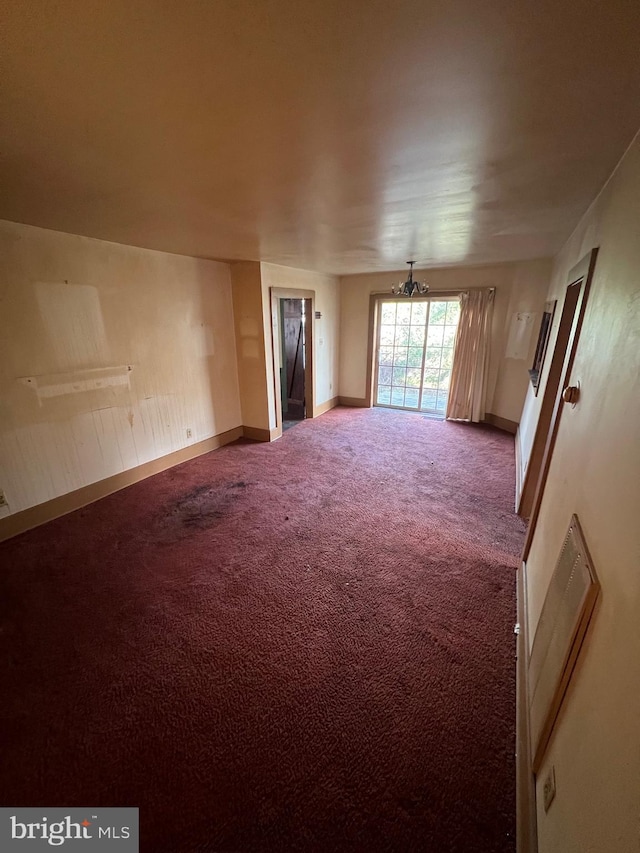 unfurnished living room with carpet floors