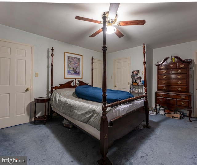 bedroom with ceiling fan and carpet floors