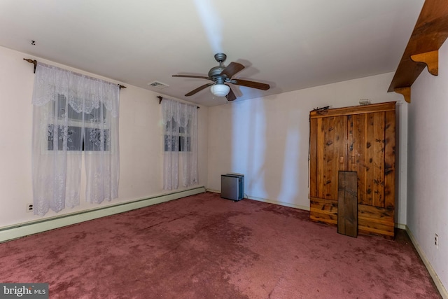 carpeted empty room featuring a baseboard radiator and ceiling fan