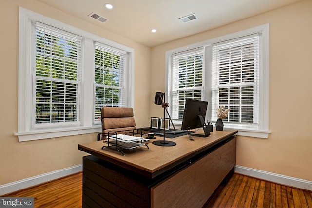 office space with hardwood / wood-style flooring