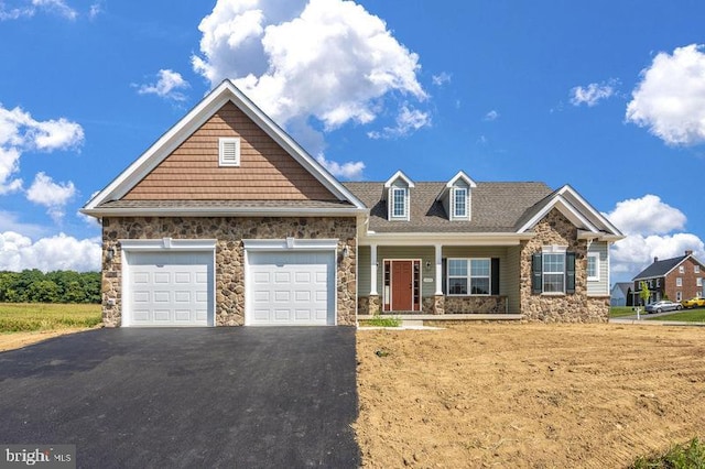 craftsman inspired home with a garage