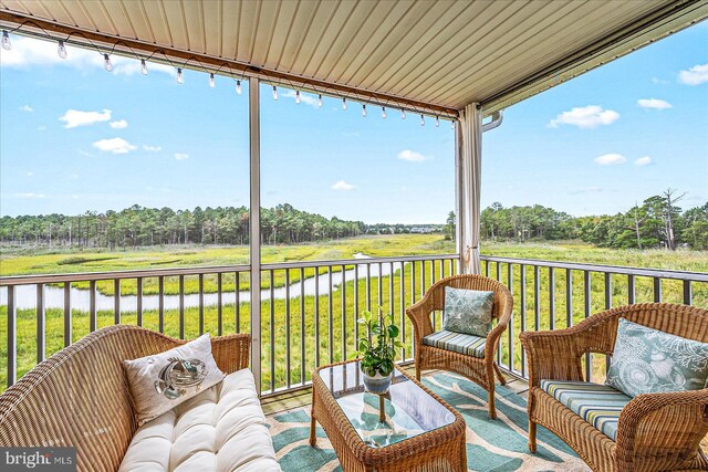 exterior space featuring plenty of natural light and a water view