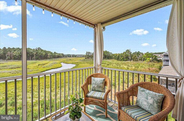 balcony featuring a rural view