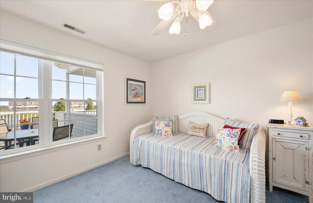 bedroom with ceiling fan and carpet