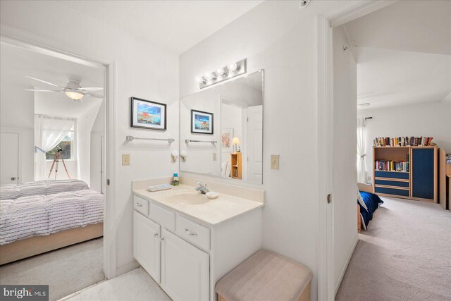 bathroom with ceiling fan and vanity