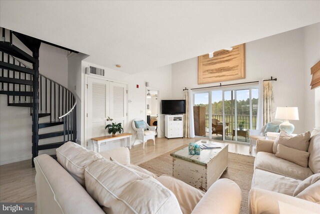 living room with light hardwood / wood-style floors