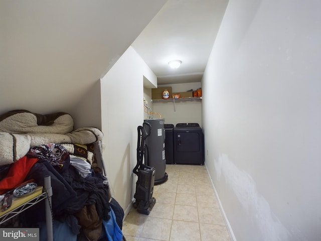 interior space featuring washer and dryer and electric water heater