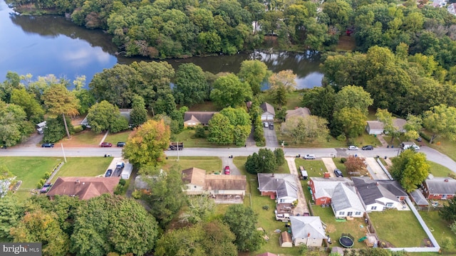 aerial view featuring a residential view and a water view