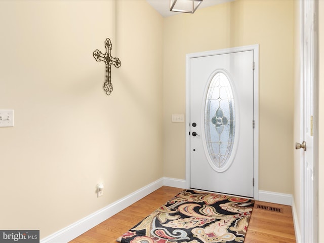 entrance foyer featuring hardwood / wood-style floors