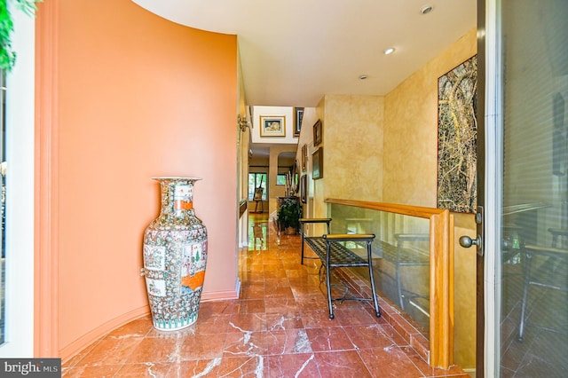 corridor with recessed lighting
