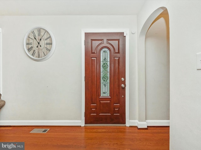 foyer with hardwood / wood-style flooring