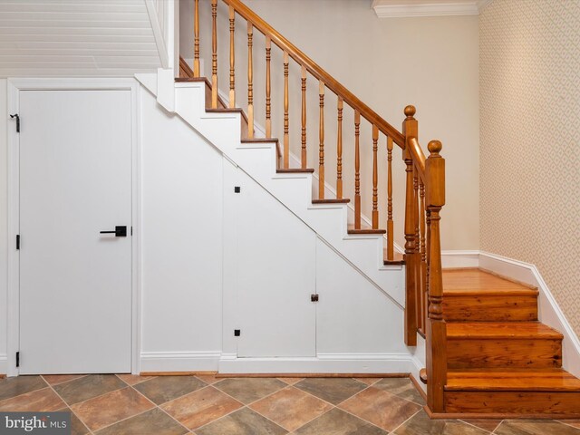 stairs with crown molding