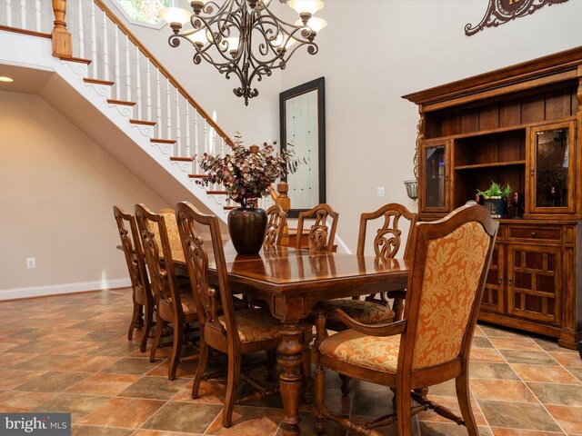 dining room featuring a notable chandelier