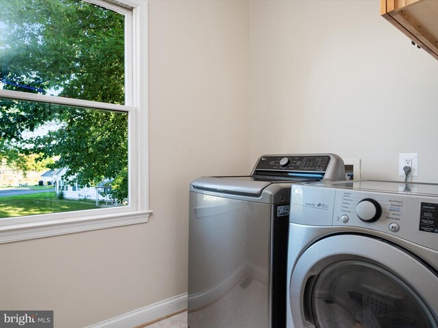 laundry area featuring separate washer and dryer