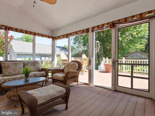 sunroom / solarium with vaulted ceiling and ceiling fan