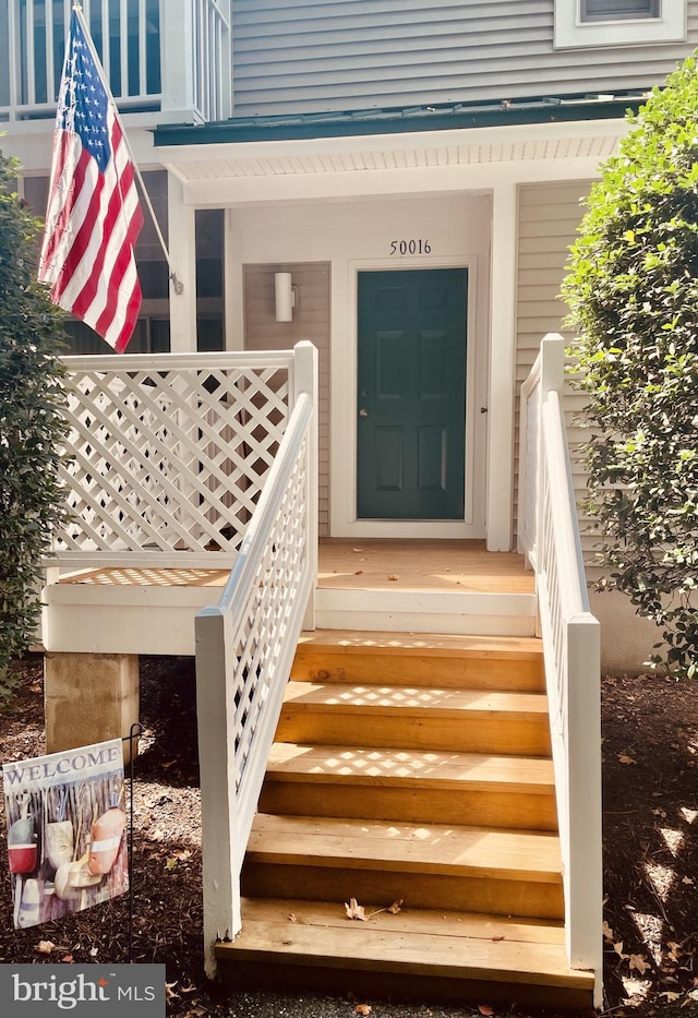 entrance to property with a porch