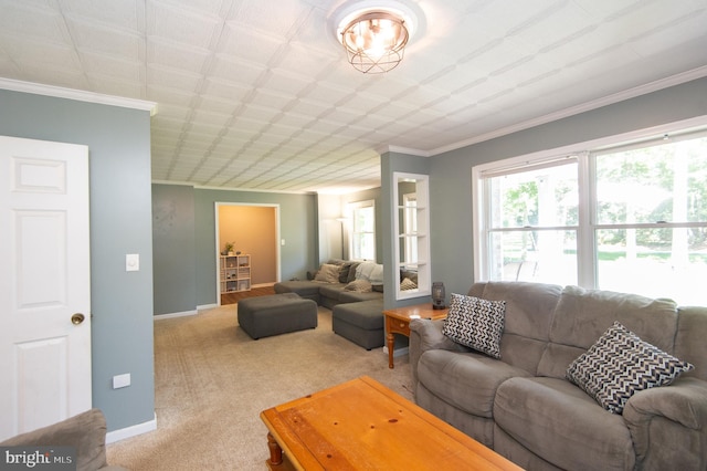 carpeted living room with ornamental molding