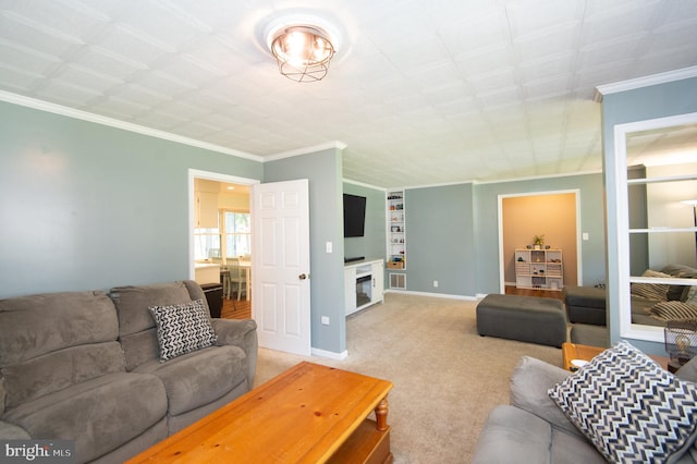 carpeted living room featuring ornamental molding