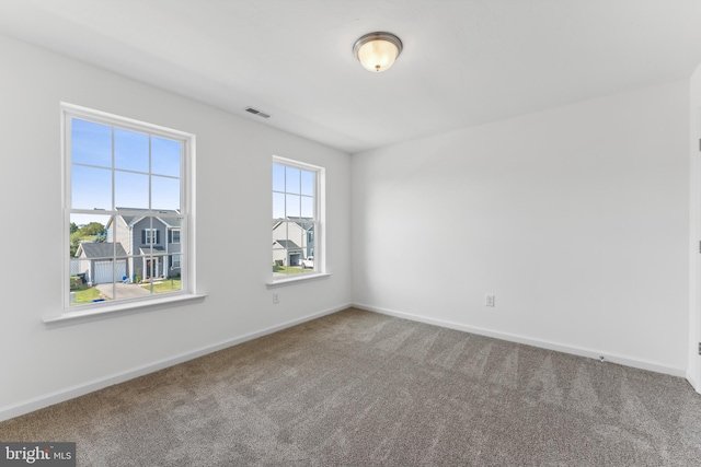 view of carpeted spare room