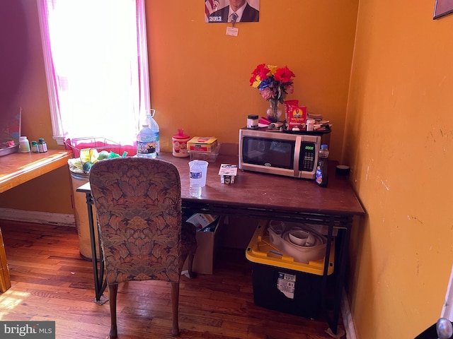 home office featuring hardwood / wood-style flooring