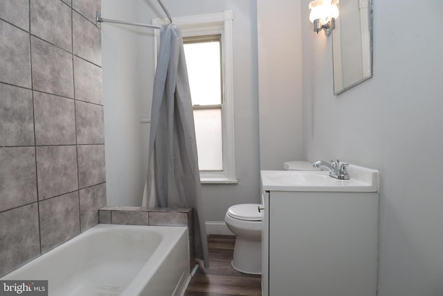 full bathroom with vanity, toilet, wood-type flooring, and shower / bath combo with shower curtain