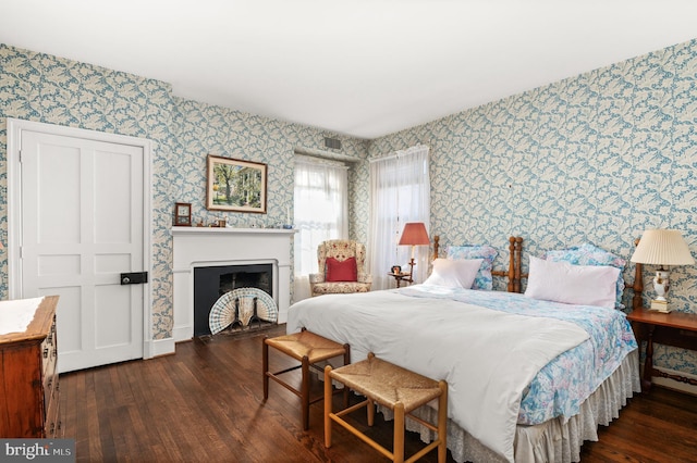 bedroom featuring dark hardwood / wood-style floors