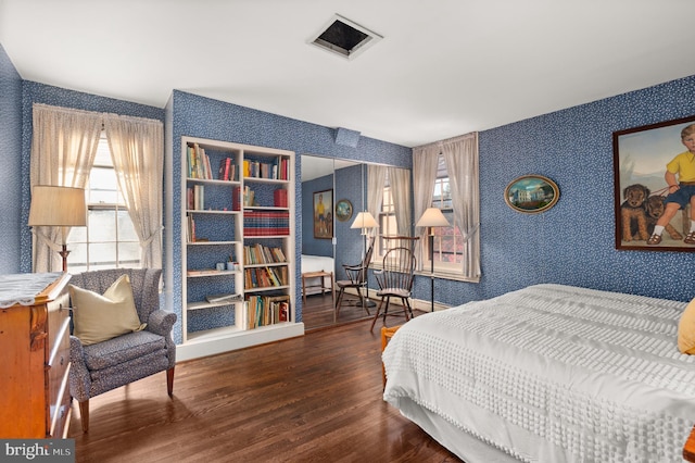 bedroom featuring hardwood / wood-style floors