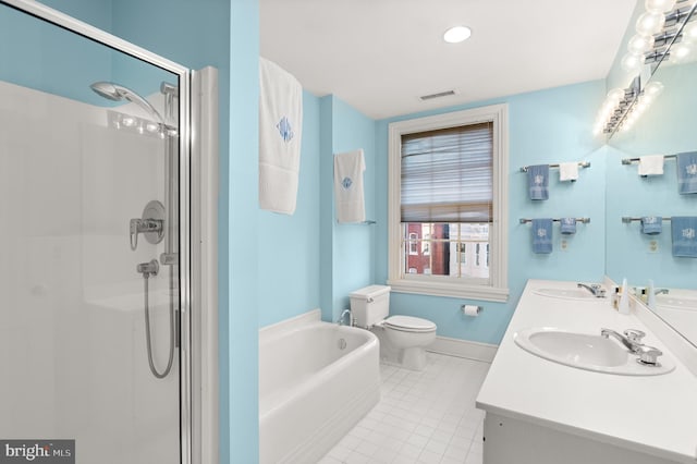 full bathroom featuring tile patterned flooring, vanity, separate shower and tub, and toilet