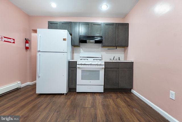 kitchen featuring white appliances, dark hardwood / wood-style flooring, tasteful backsplash, extractor fan, and baseboard heating