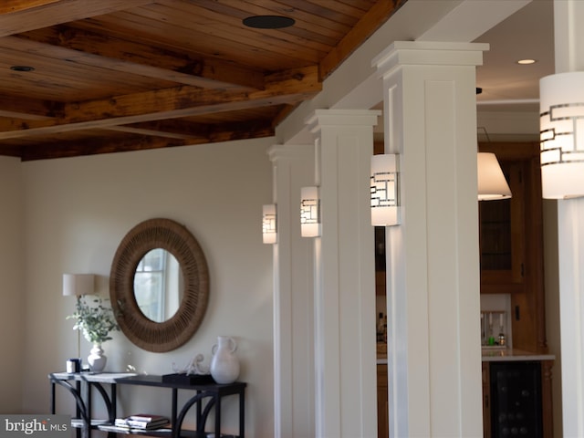 room details featuring wood ceiling and wine cooler