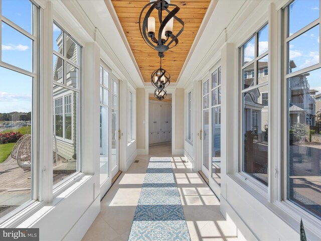 9601 Ocean Vw, Ocean City, MD 21842 - sunroom with a notable chandelier and wooden ceiling